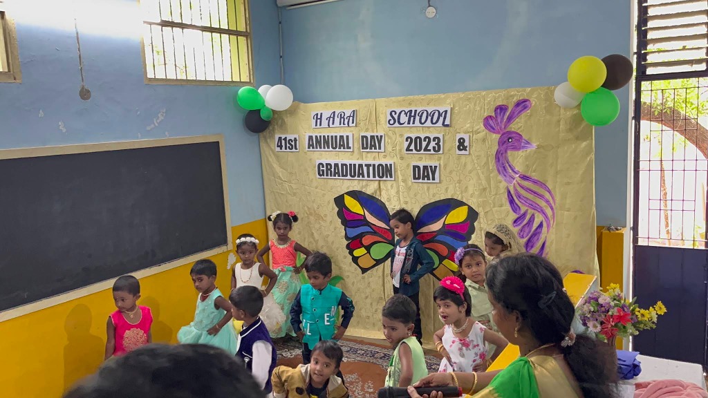 Children performing on stage during Hara School Annual Day Celebration